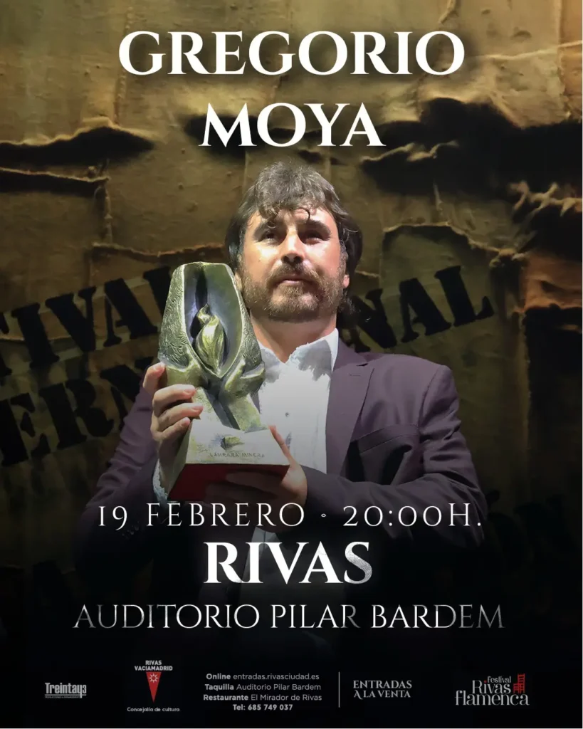 Un hombre trajeado sostiene un trofeo ante un fondo con texto. El cartel anuncia la actuación de Gregorio Moya en el 10º Festival Rivas Flamenca el 19 de febrero, a las 20:00 horas, en el Auditorio Pilar Bardem de Rivas. La información sobre las entradas figura más abajo. Un hombre trajeado sostiene un trofeo ante un fondo con texto. El cartel anuncia la actuación de Gregorio Moya en el 10º Festival Rivas Flamenca el 19 de febrero, a las 20:00 horas, en el Auditorio Pilar Bardem de Rivas. La información sobre las entradas figura más abajo.