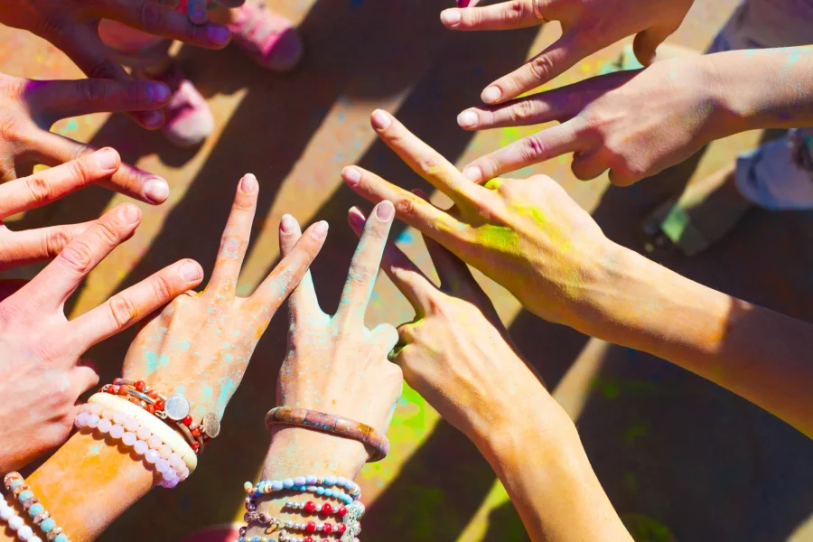 friends-putting-their-hands-together-in-a-sign-of-2025-01-10-00-21-29-utc